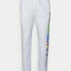 Top 10 ⭐ Hollister Co. PRIDE JOGGER UNISEX - Tracksuit Bottoms - White ✔️