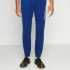 Cheapest 👏 Hollister Co. RELAXED CHAIN - Tracksuit Bottoms - Blue 🔔