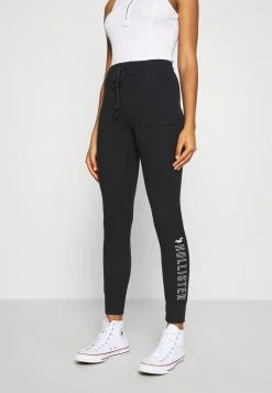 Deals 😀 Hollister Co. LOGO FLEGGING - Tracksuit Bottoms - Black 💯